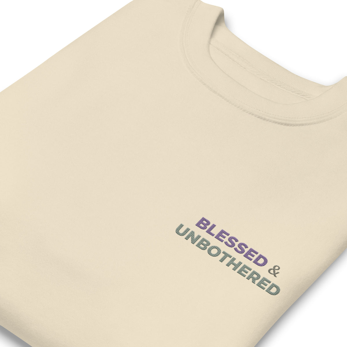 blessed and unbothered embroidery zoomed in detail purple and sage on crewneck sweatshirt